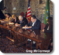 photo of people signing the IPC agreement