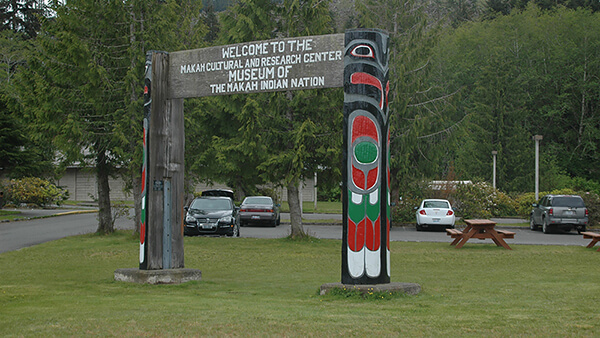 a sign welcoming visitors to the Makah Museum